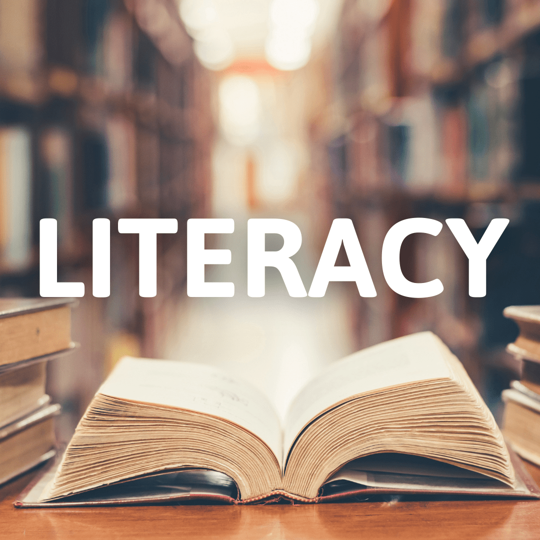 K-12 Lesson Ideas for Literacy with an open book on a table in a library